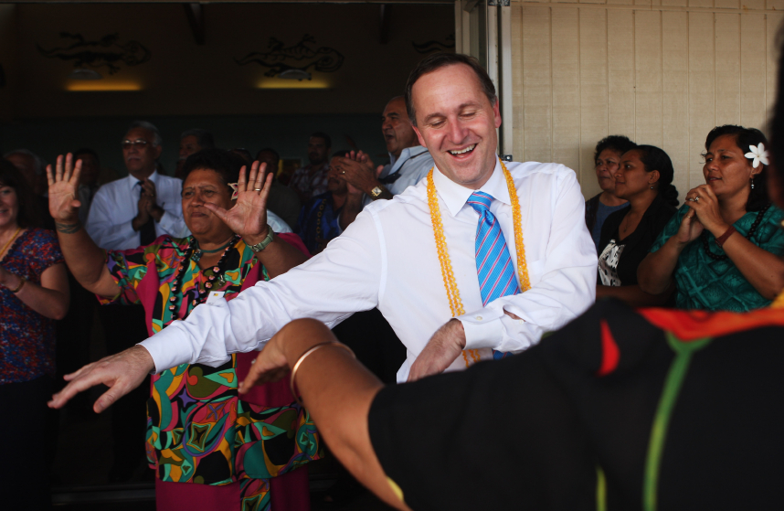 NIUE ISLAND, NIUE - JULY 08: New Zealand Prime Minister John Key joins in a dance at the Matavai Resort July 8, 2009 in Tamakautoga Village, Niue. The Prime Minister is on a four day visit to Tonga, Samoa, Niue and the Cook Islands for the first time in his role as Prime Minister of New Zealand. (Photo by Phil Walter/Getty Images)